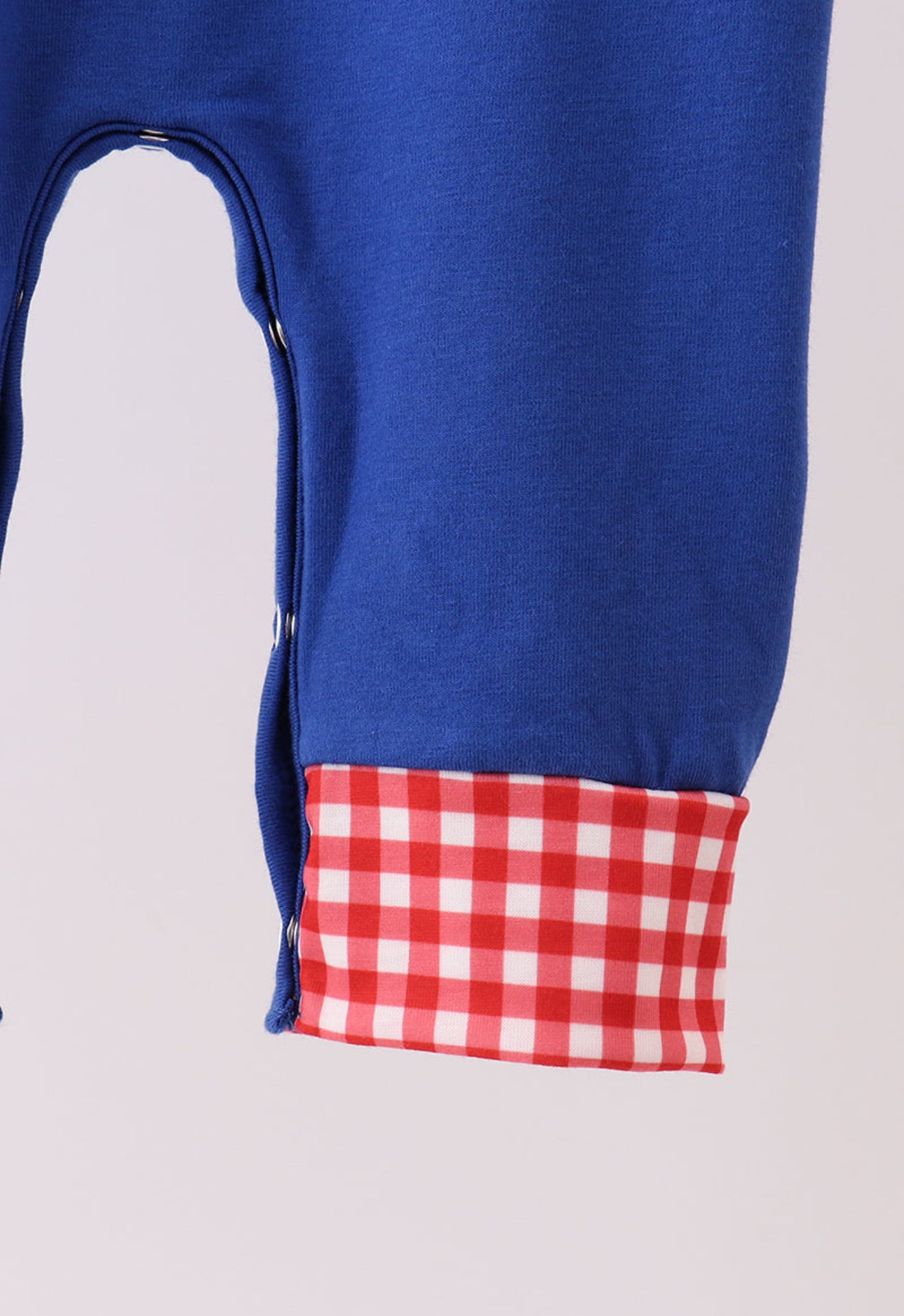 Little Heroes Checkered Romper – Blue & Red Superhero One-Piece